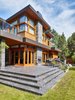 Luxurious top quality stone, wood and glass come together to provide an spacious and elegant back yard presence Photo 9 of The Gravity House modern home