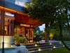 Elegant evening view of stunning back corner deck Photo 6 of The Gravity House modern home