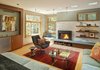 The living room, with a Vermont marble slab at the fireplace wall. Photo 8 of Sustainable Urban Villa modern home