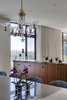 Dining Room overlooking live edge millwork separating Living Room area Photo 8 of Boston Suburbs modern home