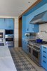 Custom cabinetry with hand painted tile floor Photo 9 of Boston Suburbs modern home