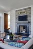 reclaimed wood surround at fireplace Photo 15 of Boston Suburbs modern home