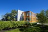 view from side yard showing limestone wall at exterior Photo 18 of Boston Suburbs modern home