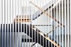 Walnut and Steel stair connecting all floors Operable Louvered Panel - LouvreTec Photo 7 of Lyon Residence modern home