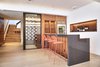 The Great Room - wet bar, wine room, entertainment space Photo 15 of Lyon Residence modern home
