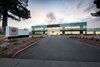 Modern home with Office. Innovation - Time and cost saving installation of new glass skin Photo 4 of 3001 Orchard Parkway
