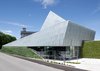 Modern home with Outdoor and Shrubs. New skin for a church Photo of Community centre and church, Rif