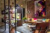 The customized shelves provide privacy to the open concept of the living room and other areas of the house Photo 4 of Plantation House modern home