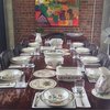 The dining room is also an open concept with folding glass doors on both sides Photo 13 of Plantation House modern home