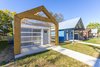 Front Porch with Roll-up Door Photo of York Street Maker Spaces modern home