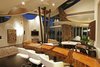 The triple steel pipe holds up most of the multilayered rooves overhead. Photo 15 of Scottsdale Desert Home modern home