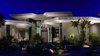 Modern home with Exterior, Mid-Century Building Type, House Building Type, and Flat RoofLine. Just the right amount of exterior building and landscape lighting. Photo 9 of New contemporary home design in Arizona