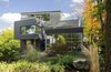 Modern home with Outdoor, Walkways, Hardscapes, Shrubs, Trees, Gardens, Front Yard, Woodland, and Garden. Brookline Residence in Brookline, Massachusetts Photo of Brookline Residence