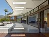 The courtyard side of the house is an exercise in transparency. Sliding glass panels open up the
entire house to the outdoors. Photo 5 of Ziering Residence modern home