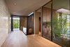 Interior materials include a diverse selection of wood and stone that was custom
tailored to the owner’s requirements. Photo 4 of Nightingale Residence modern home