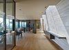 Several rectangular skylights throughout the home contribute to balancing the light within the main living spaces. Photo 6 of Nightingale Residence modern home