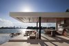 Outdoor kitchen featuring a cantilevered cabana Photo 2 of Casa Clara modern home