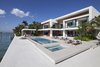 Rear exterior with pool, hot tub, and private white sand beach Photo 4 of Casa Clara modern home