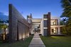 Front entrance featuring cascading water wall Photo 8 of Casa Clara modern home