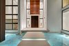 Residence front entrance with floating stepping stones and reflecting pond Photo of Allison Road Residence modern home