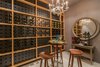 The residence's wine cellar holds more than 600 bottles of wine. Photo 17 of North Bay Road Residence modern home