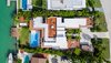 An aerial shot of the residence shows off the 2,500-square-foot rooftop deck. Photo 18 of North Bay Road Residence modern home