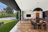 The kitchen and informal dining area opens up to a yard. Photo 5 of Ponce Davis Residence modern home