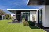 Each room was designed to include a connecting outdoor patio complete with a cantilevered overhang for full shade. Photo 8 of Ponce Davis Residence modern home