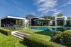 The South Florida residence is located on 1.5 acres of land and measures close to 12,000 square feet. Photo 10 of Ponce Davis Residence modern home