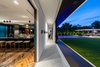 Every room in the house opens up to the outdoors creating a seamless indoor-outdoor environment. Photo 13 of Ponce Davis Residence modern home
