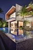 Modern home with Outdoor, Infinity Pools, Tubs, Shower, Back Yard, Plunge Pools, Tubs, Shower, and Trees. Iridescent blue mosaic tiles cover the infinity-edge pool and spa providing a colorful contrast to the home's mostly neutral color scheme. Photo 10 of Casa Ischia
