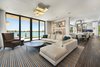 Floor-to-ceiling glass doors allow for views of the water from almost any room in the residence. Photo 8 of Rivo Alto Residence modern home