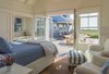 Guest cottage french doors provide welcome access to a sunny iconic courtyard. Photo 8 of Corkin House modern home