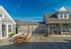 The west side of the courtyard opens magically to Cape Cod Bay and beyond. Photo 11 of Corkin House modern home
