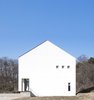 Modern home with Front Yard, Concrete Patio, Porch, Deck, Large Patio, Porch, Deck, and Outdoor. West Elevation Photo 2 of A House