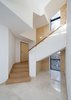 Modern home with Staircase, Wood Railing, and Wood Tread. Stair 1 Photo 3 of A House