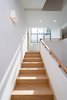 Modern home with Staircase, Wood Tread, and Wood Railing. Stair 2 Photo 6 of A House