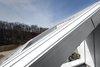 Modern home with Outdoor and Rooftop. South Facing Angled Roof Photo 10 of A House