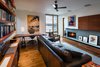 Modern home with Living Room, Recessed Lighting, Chair, Medium Hardwood Floor, Sofa, and Wood Burning Fireplace. Library/Office Photo 16 of House on Little Round Bay