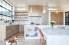 Avenues Residence family enjoying the fun pendant lights Photo-Aaron Shaw Photo 7 of 529 Avenues Residence modern home