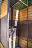 Metal work is seen throughout the exterior design, including on the outdoor shower. Young and his sons used existing copper piping to make their own shower head. "It has now oxidized and is starting too look really cool," said Young.
Photo 6 of 1600 Lakeside modern home