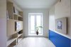 Modern home with Kids Room, Storage, Den Room Type, Playroom Room Type, Bookcase, Medium Hardwood Floor, Shelves, Bedroom Room Type, Teen Age, Boy Gender, Chair, Bed, Pre-Teen Age, Living Room Room Type, and Girl Gender. But in a stepfamily, where the family changes in size and constellation, it can seem like a waste of good and expensive square meters to occupy a whole room as a children’s room that will only be used every second week. Therefore, Spacon & X has designed a fold-out solution, that combines the need of a pre-teen room in one week and an adult work-station in the other. Photo 13 of CUSTOM LIVING