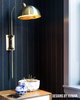 Custom brass wall sconces. Photo 10 of East Harlem Residence modern home