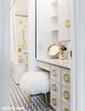Modern home with Bath Room, Marble Counter, Marble Floor, Drop In Sink, Open Shower, Drop In Tub, Ceiling Lighting, Wall Lighting, Subway Tile Wall, Marble Wall, and Two Piece Toilet. Detail of entrance to Bathroom. Photo 9 of Brooklyn Heights Glam Apartment
