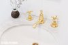 Modern home with Bath Room, Marble Counter, Drop In Sink, Subway Tile Wall, and Marble Wall. Detail of un-lacquered brass fixtures. Photo 2 of Brooklyn Heights Glam Apartment