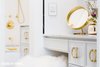Modern home with Bath Room, Marble Counter, Drop In Sink, Marble Floor, Drop In Tub, Ceiling Lighting, Open Shower, Wall Lighting, Marble Wall, Subway Tile Wall, and Two Piece Toilet. Detail of vanity. Photo 10 of Brooklyn Heights Glam Apartment