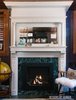 Restored fireplace mantle and surround with new life. Photo of Park Slope Book Editors Work Room modern home