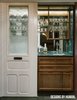 Modern home with Storage Room and Cabinet Storage Type. Original doors re-purposed to slide out of the way for the bar area. Photo 3 of Park Slope Book Editors Work Room
