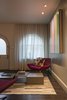 Modern home with Living Room, Chair, Dark Hardwood Floor, Coffee Tables, and Recessed Lighting. Entry space Photo 3 of Hobbit House