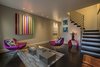 Modern home with Living Room, End Tables, Chair, Coffee Tables, Dark Hardwood Floor, and Recessed Lighting. Entry space Photo 5 of Hobbit House